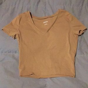 I am selling a cropped shirt.